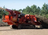 New Drum Chipper working in field